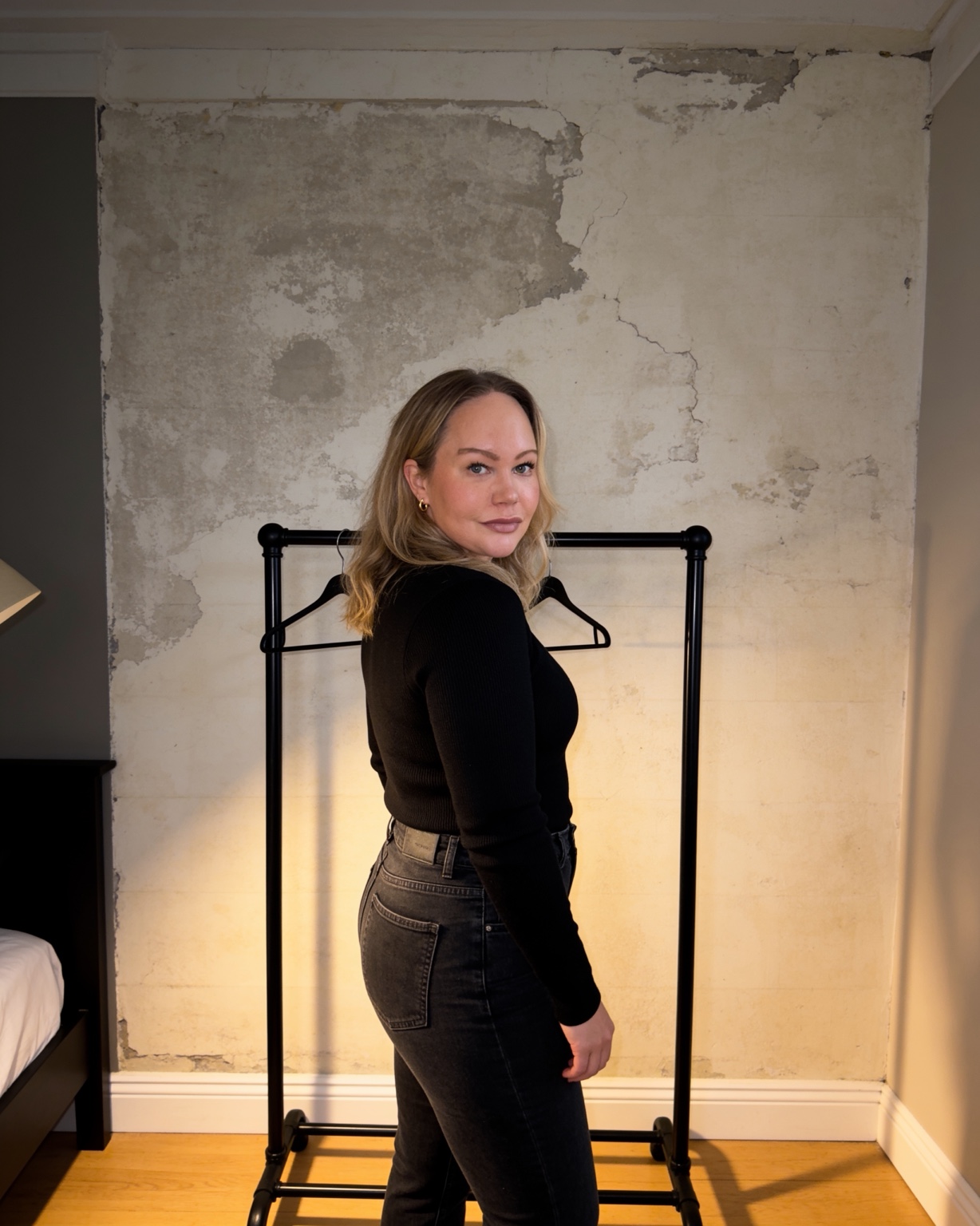 Founder portrait in a raw architectural interior